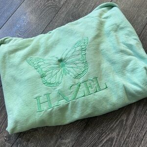 Hazel Green Sweatshirt with Butterfly Design